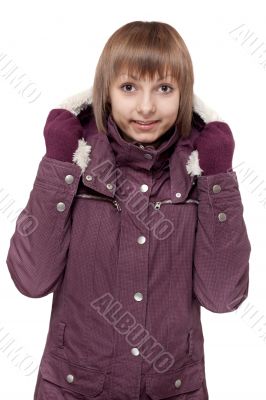 Girl in winter violet hooded jacket
