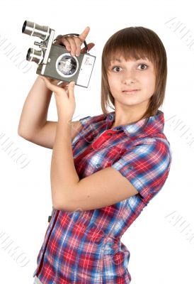 Girl in plaid shirt with movie camera