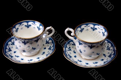 Two tea cups on saucer