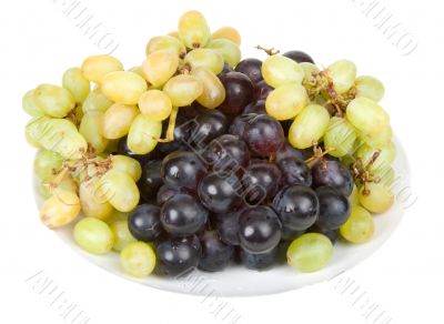 Plate with ripe grape