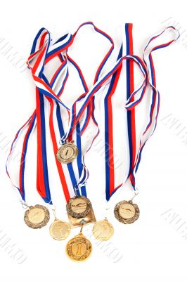 Golden medals with tape