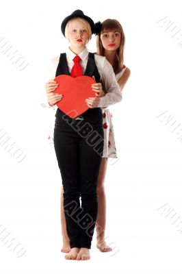 Two girls with red cardboard heart