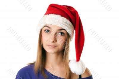 Beautiful girl in red Santa hat