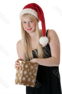 Young beautiful girl in a Santa hat