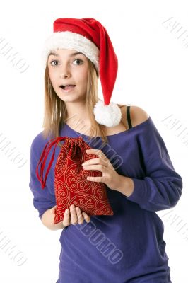 Beautiful girl in red Santa hat