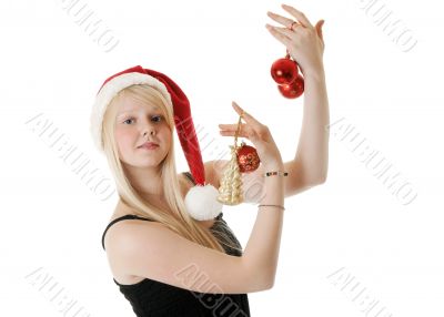 Young beautiful girl in a Santa hat