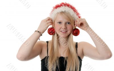 Beautiful blonde girl in a Santa hat