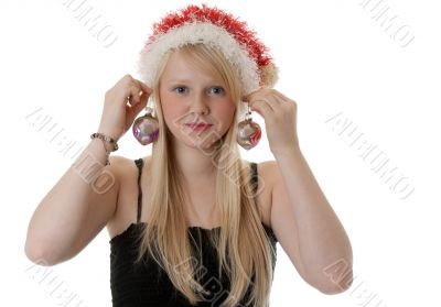 Beautiful blonde girl in a Santa hat