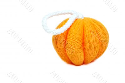 Yellow sponge in the shape of a pumpkin