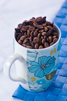 Coffee beans with chunks of dark chocolate