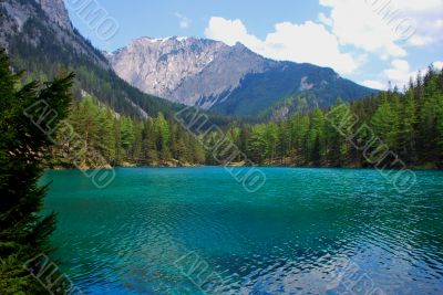 green lake with mountain