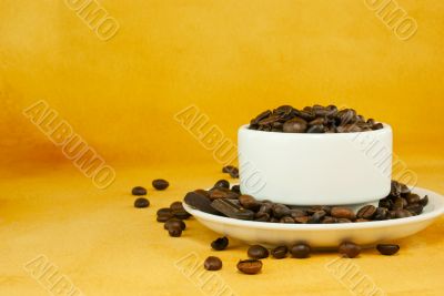 Cup full with coffee beans