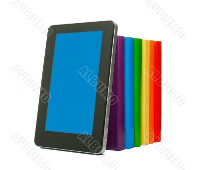 Row of colorful books and tablet PC