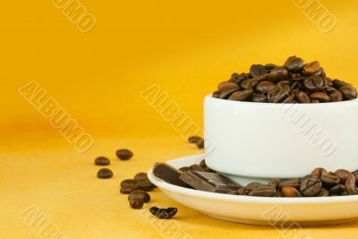 Cup full with coffee beans