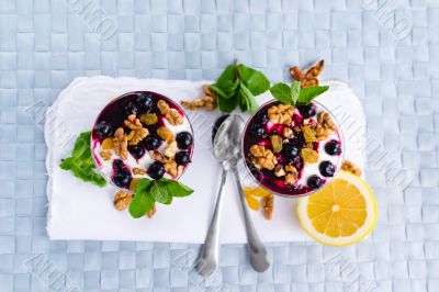 cream dessert with black currants