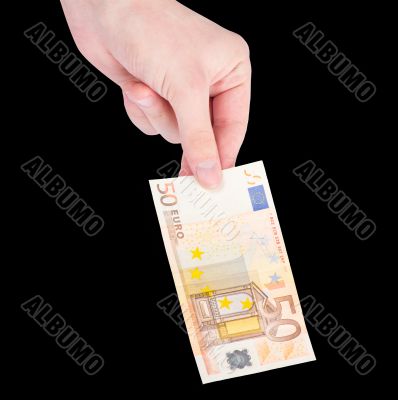 Money (Euro) in a hand isolated on black