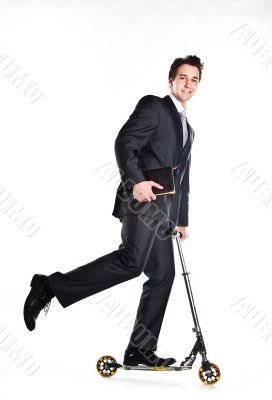 Businessman on scooter