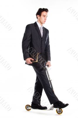 Businessman on scooter