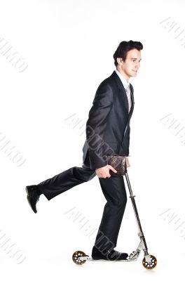 Businessman on scooter