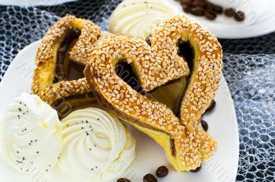 heart-shaped pastry with sesame seeds
