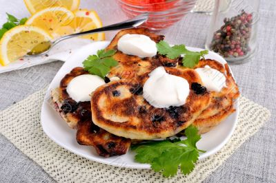 Fried pancakes with blackcurrant  