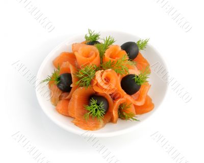 Appetizer of salmon with fennel and olives on a white background