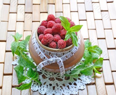 Raspberries in a jar