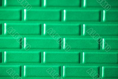 Wall of metallic bricks