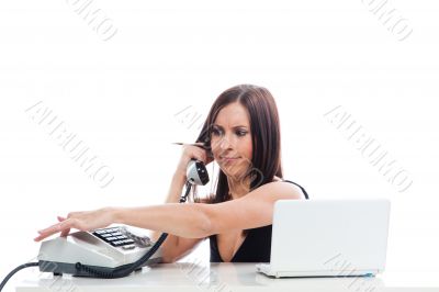 Secretary girl with an old phone and laptop