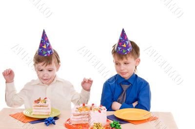 two boys with cake