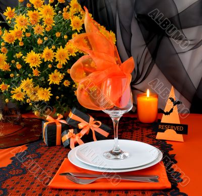 Festive table with gifts for Halloween
