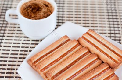 Delicious sugar cookies and a cup of coffee
