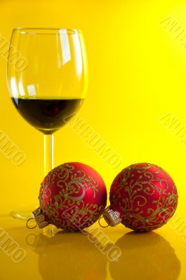 New Year`s still life - glasses of wine and Christmas balls