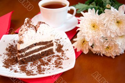 Tea, cake and white chrysanthemums, still life