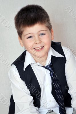 Portrait of a Boy in a business suit. 