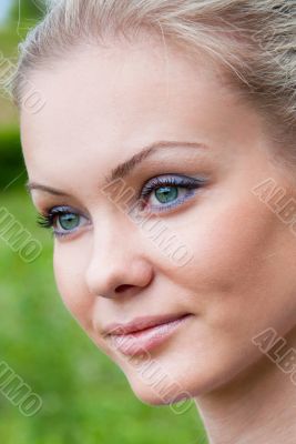 Portrait of a beautiful girl in the park