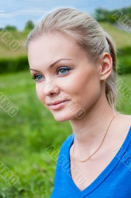Portrait of a beautiful girl in the park