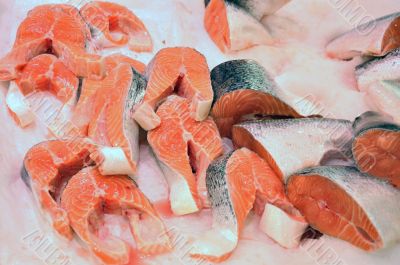 Fresh salmon steaks in the shop