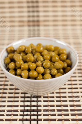 Canned green peas in the salad bowl