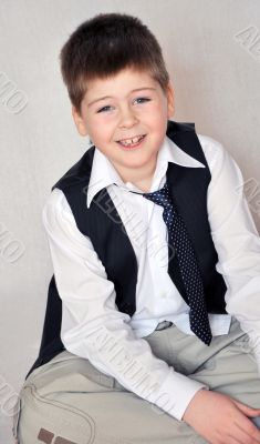 Portrait of a Boy in a business suit. 