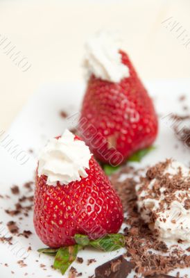 Appetizing fresh strawberries with cream