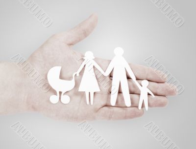 Paper family in hands