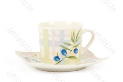 Fine china cup and saucer filled  isolated on white