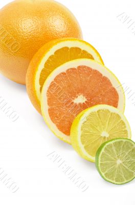 Vitamin C Overload, Stacks of sliced fruit isolated on white