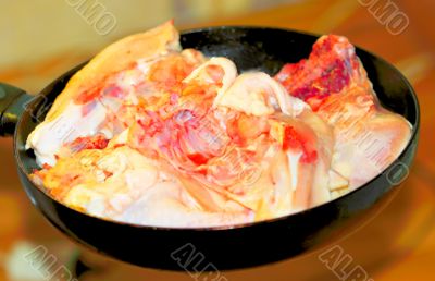  meat fried in a skillet