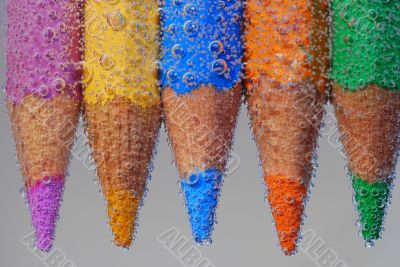 five colored pencil with bubbles