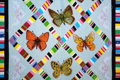 Patchwork quilt with butterflies