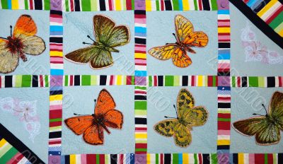 Patchwork quilt with butterflies