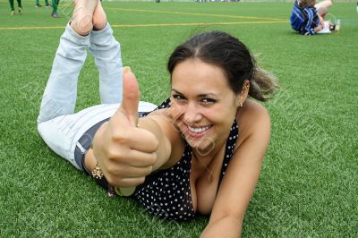 Young sexy girl with thumbs up