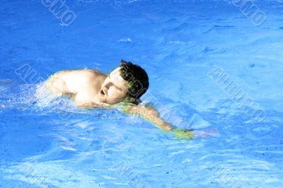 young sports swimmer in pool